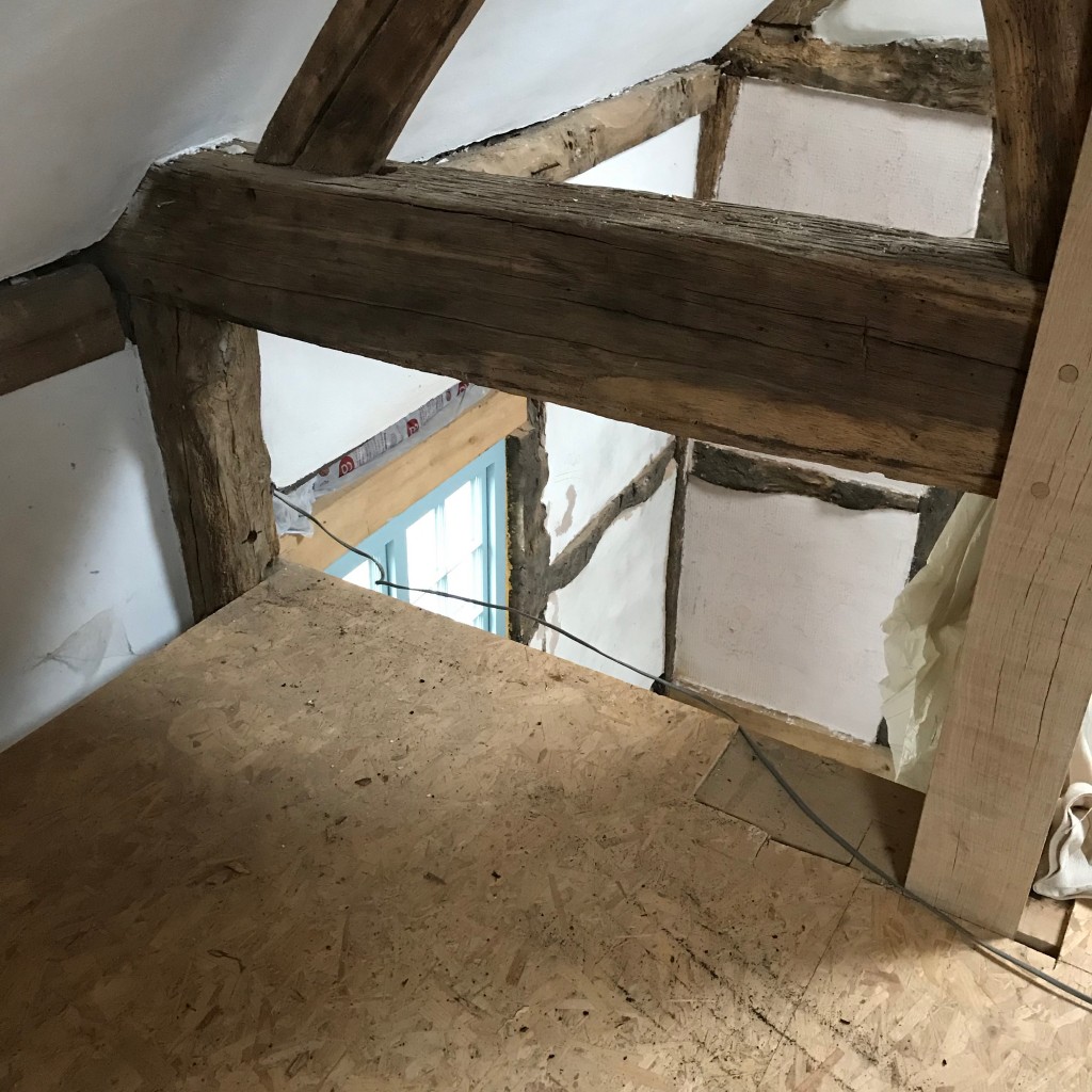 Gap between oak truss and floor on 2nd floor.